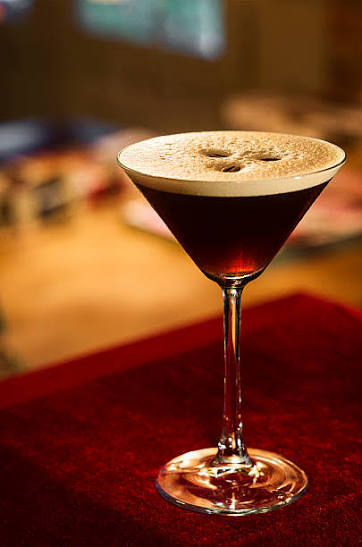 This image has an empty alt attribute; its file name is martini.jpeg